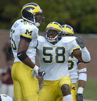 Ernest Shazor (25) and Roy Manning (58)