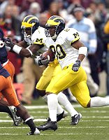 Michael Hart (20) and Braylon Edwards (1)