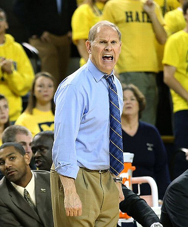 LaVall Jordan, Bacari Alexander, and John Beilein