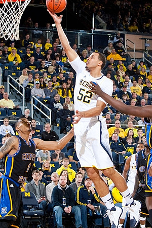 Jordan Morgan (52) and Glenn Robinson III (1)