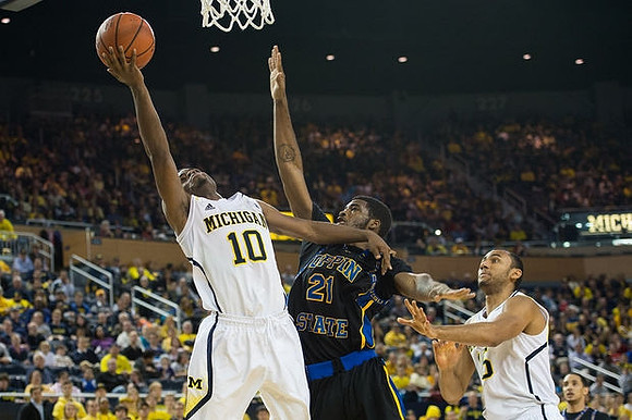 Derrick Walton Jr. (10) and Jon Horford (15)