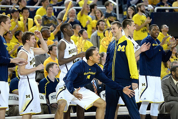 Mark Donnal (34), Spike Albrecht (2), Caris LeVert (23), Jordan Morgan (52), Nik Stauskas (11), Mitch McGary (4), and Glenn Robinson III (1)