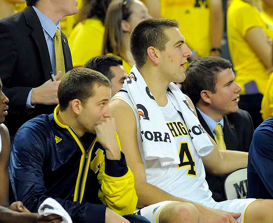 Nik Stauskas (11) and Mitch McGary (4)