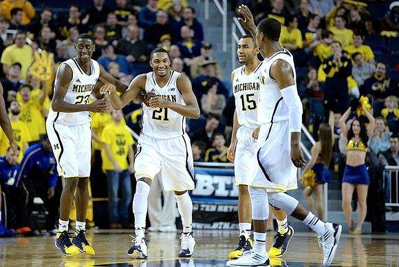 Caris LeVert (23), Zak Irvin (21), Jon Horford (15), and Glenn Robinson III (1)
