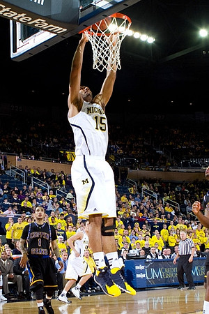 Jon Horford (15) and Andrew Dakich (5)