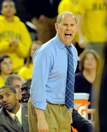LaVall Jordan, Bacari Alexander, and John Beilein