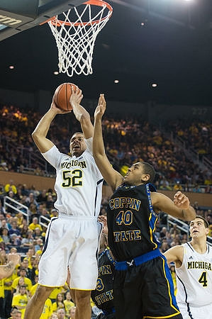 Jordan Morgan (52) and Mitch McGary (4)