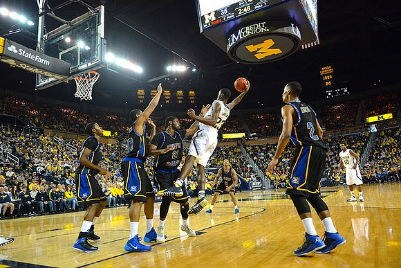 Caris LeVert (23) and Derrick Walton Jr. (10)