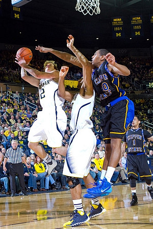 Spike Albrecht (2) and Jordan Morgan (52)