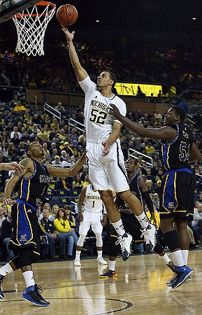 Jordan Morgan (52) and Glenn Robinson III (1)