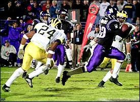 Charles Drake (24) and Larry Foote (17)