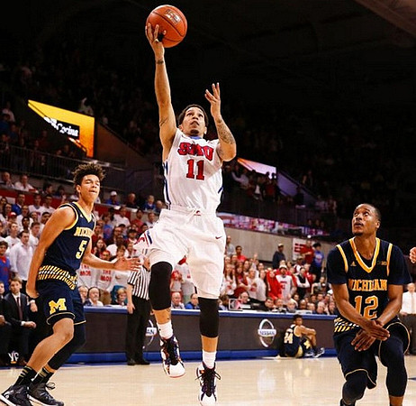 D.J. Wilson (5) and Muhammad-Ali Abdur-Rahkman (12)
