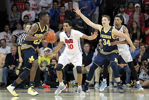 Caris LeVert (23) and Mark Donnal (34)