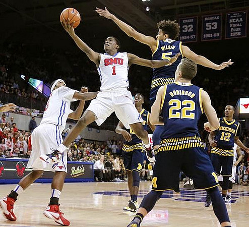 Caris LeVert (23), Duncan Robinson (22), D.J. Wilson (5), and Muhammad-Ali Abdur-Rahkman (12)