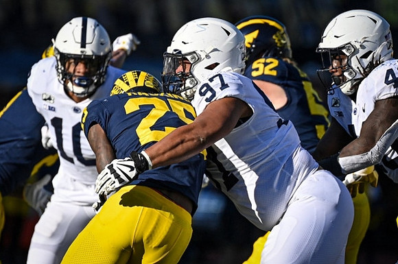 Hassan Haskins (25) and Karsen Barnhart (52)