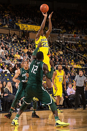 Caris LeVert (23) and Zak Irvin (21)