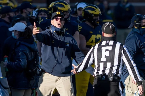 Jim Harbaugh and Ben Mason (42)