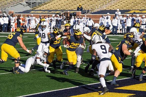 Chuck Filiaga (66), Karsen Barnhart (52), Hassan Haskins (25), Nick Eubanks (82), Ben Mason (42), and Zach Carpenter (58)