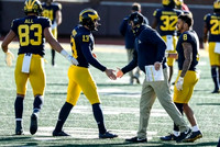 Erick All (83), Jake Moody (13), Jim Harbaugh, and Ronnie Bell (8)