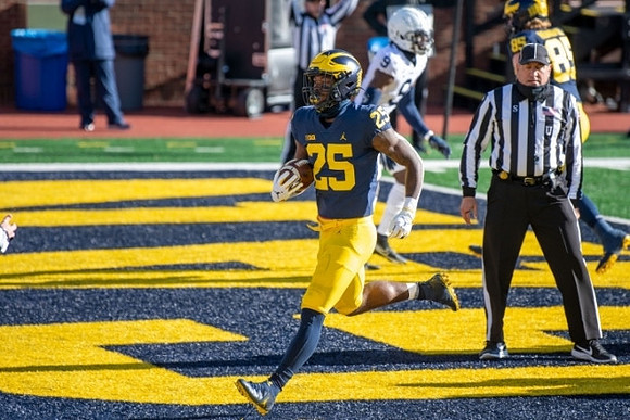 Hassan Haskins (25) and Joel Honigford (85)