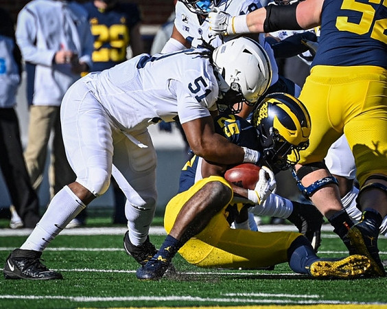 Hassan Haskins (25) and Karsen Barnhart (52)