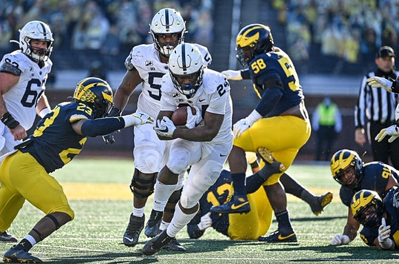 Michael Barrett (23), Josh Ross (12), Mazi Smith (58), and Taylor Upshaw (91)
