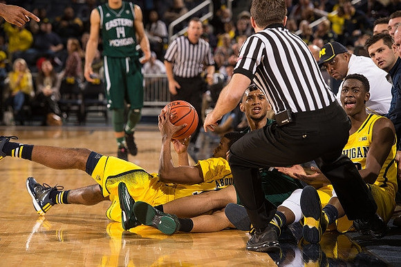 Muhammad-Ali Abdur-Rahkman (12) and Caris LeVert (23)