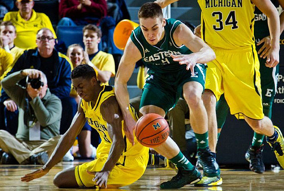 Caris LeVert (23) and Mark Donnal (34)