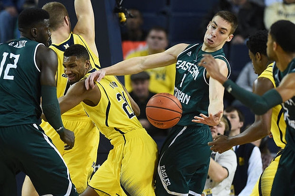Max Bielfeldt (44), Zak Irvin (21), and Derrick Walton Jr. (10)