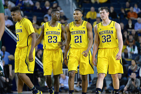 Kameron Chatman (3), Caris LeVert (23), Zak Irvin (21), and Ricky Doyle (32)