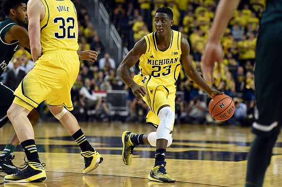 Ricky Doyle (32) and Caris LeVert (23)