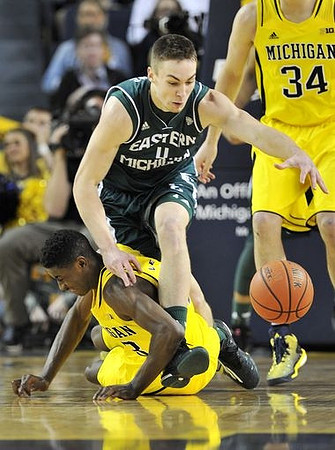 Caris LeVert (23) and Mark Donnal (34)