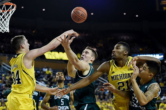 Mark Donnal (34) and Zak Irvin (21)
