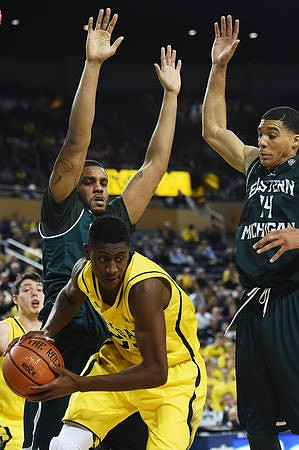 Ricky Doyle (32) and Caris LeVert (23)