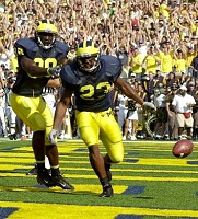 Chris Perry (23) and Tim Massaquoi (88)