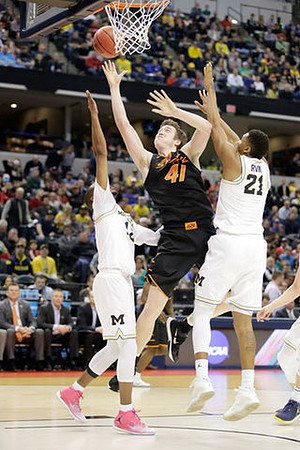 Muhammad-Ali Abdur-Rahkman (12) and Zak Irvin (21)