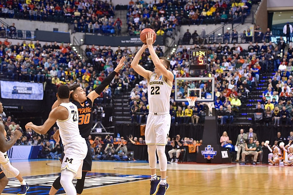 Zak Irvin (21) and Duncan Robinson (22)