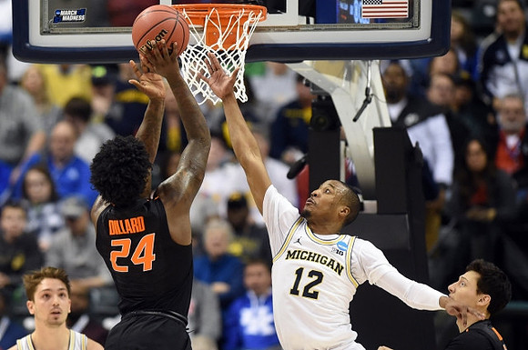 Mark Donnal (34) and Muhammad-Ali Abdur-Rahkman (12)