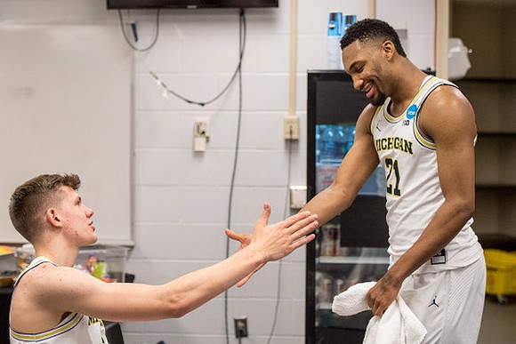 Moritz Wagner (13) and Zak Irvin (21)