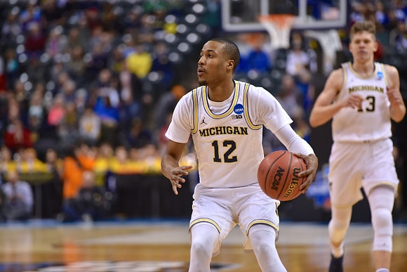 Muhammad-Ali Abdur-Rahkman (12) and Moritz Wagner (13)