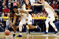 Derrick Walton Jr. (10) and Moritz Wagner (13)