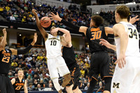 Derrick Walton Jr. (10) and Mark Donnal (34)