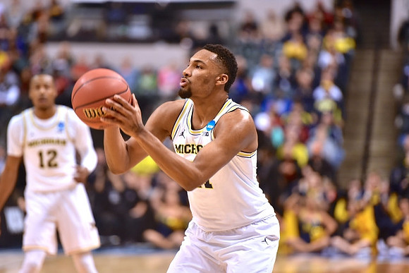 Muhammad-Ali Abdur-Rahkman (12) and Zak Irvin (21)