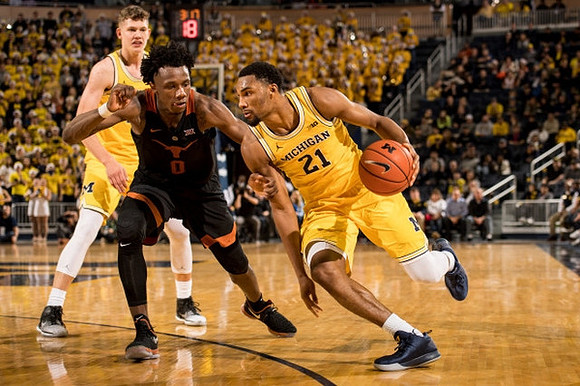 Moritz Wagner (13) and Zak Irvin (21)