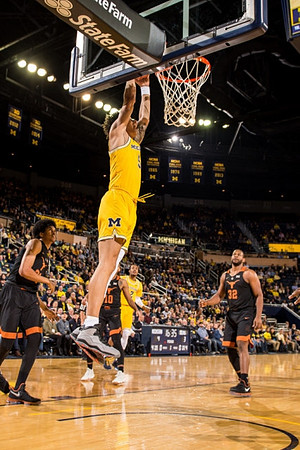 D.J. Wilson (5) and Muhammad-Ali Abdur-Rahkman (12)