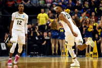 Muhammad-Ali Abdur-Rahkman (12) and Zak Irvin (21)