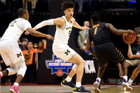 Muhammad-Ali Abdur-Rahkman (12) and D.J. Wilson (5)