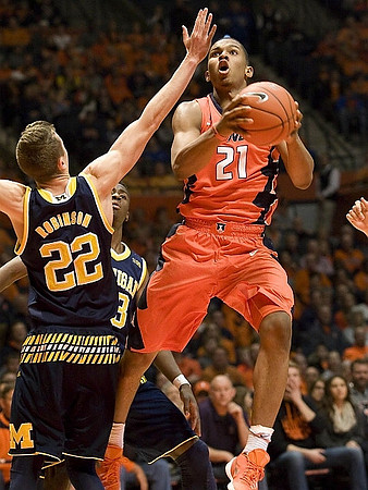 Duncan Robinson (22) and Caris LeVert (23)