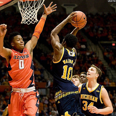 Derrick Walton Jr. (10) and Mark Donnal (34)
