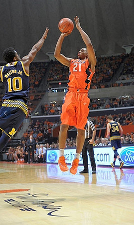 Derrick Walton Jr. (10) and Mark Donnal (34)